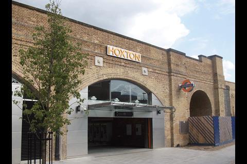 The entrance at Hoxton displays the stainless steel and co-ordinated signage that is a unifying feature on the East London Line stations